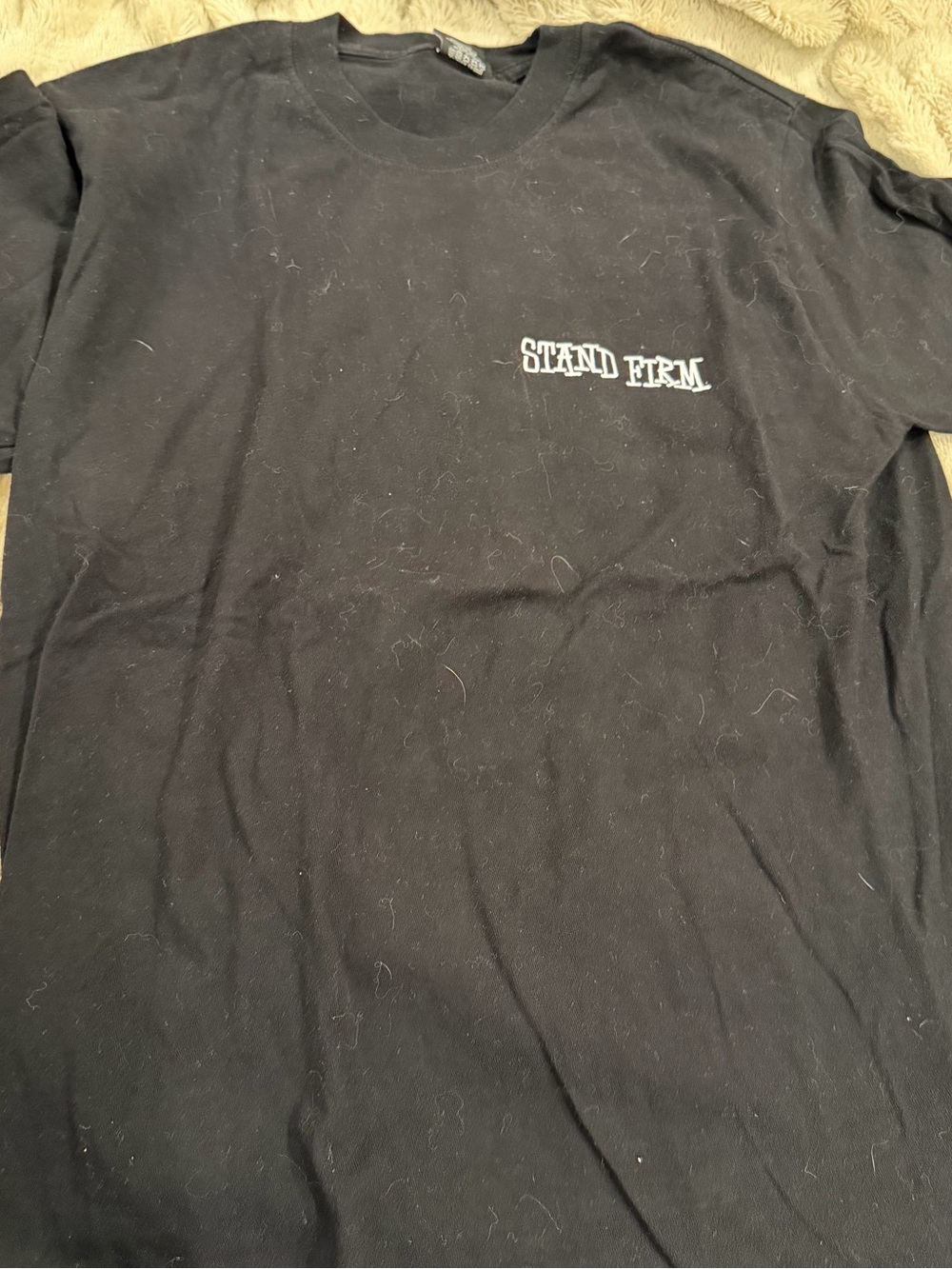 Stussy Black Tee with White "Stand Firm" Chest Graphic